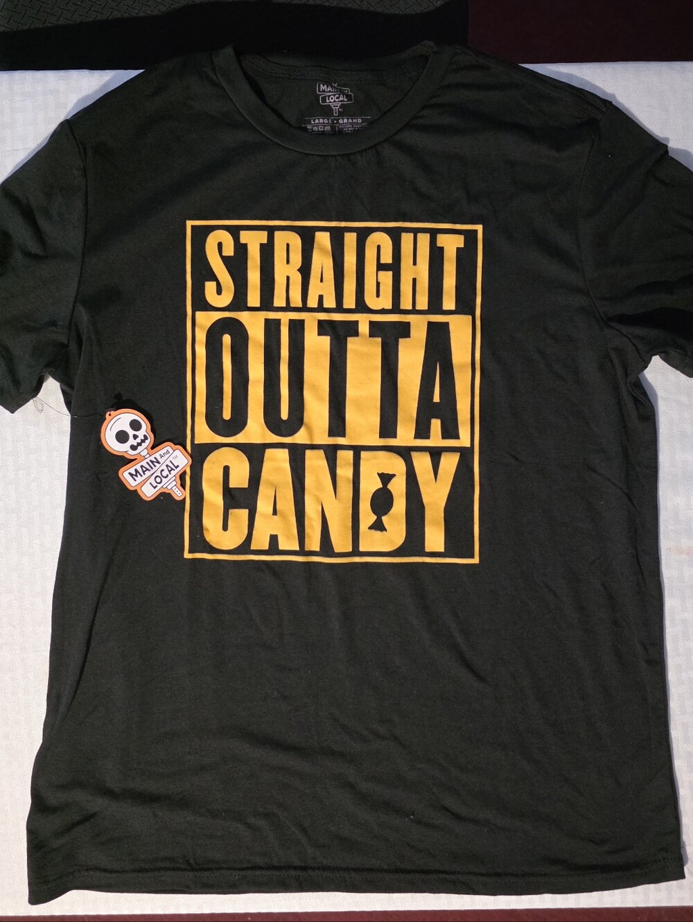 Black Short Sleeve Tee with Orange "Straight Outta Candy" Graphic